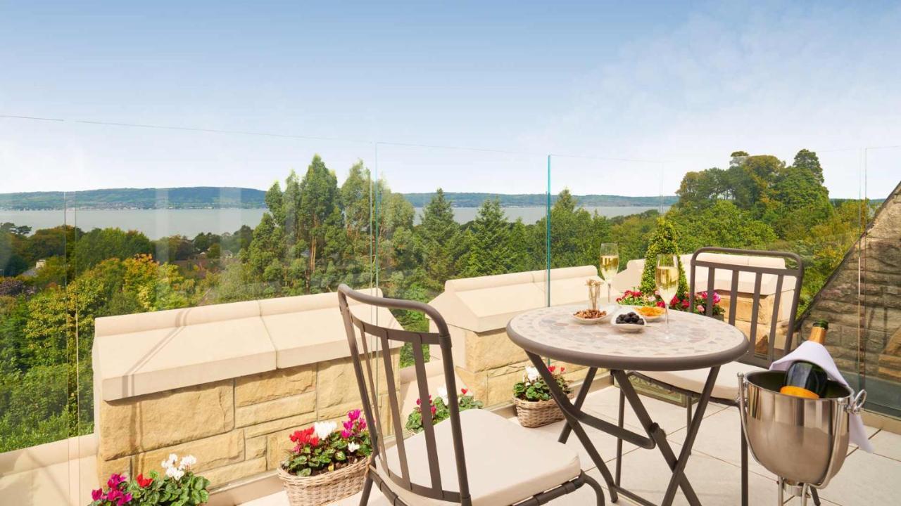 The Culloden Estate And Spa Holywood  Exterior photo A view of the lake from the balcony of a house in the village